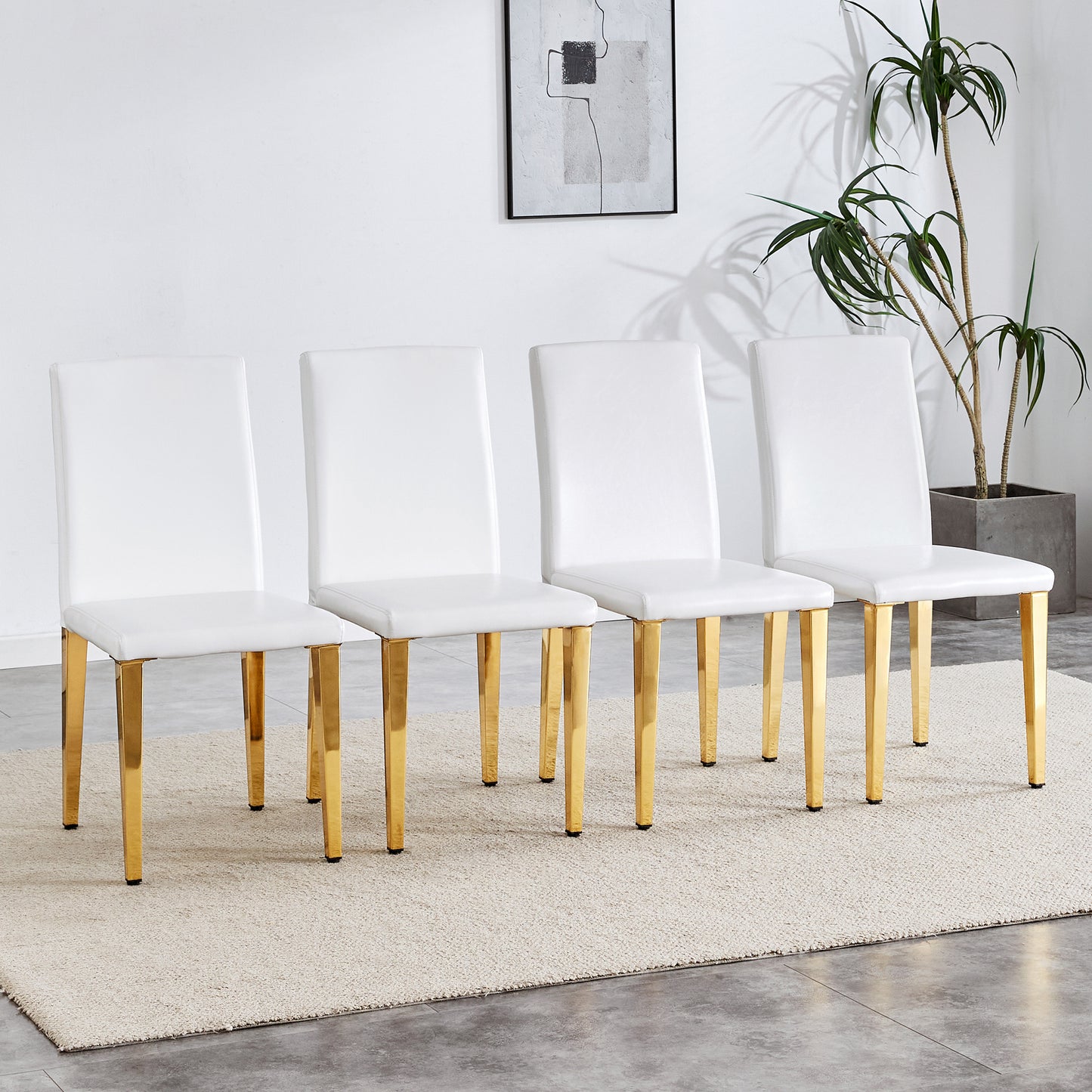 A set of 4 white PU leather backrest chairs with gold metal legs -A perfect match, suitable for minimalist and contemporary home decor styles, with product dimensions of 16.2*18.5*34.6 inches.
