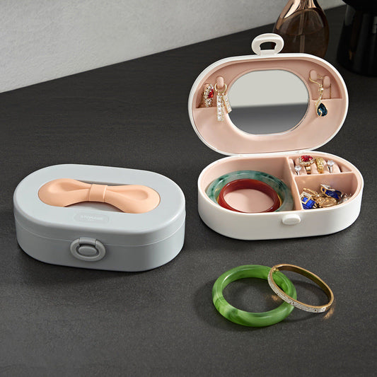 Spacious Bow Handle Jewelry Box for Rings, Bracelets, Necklaces, and Earrings - Versatile High-End Storage Solution. Livingsource