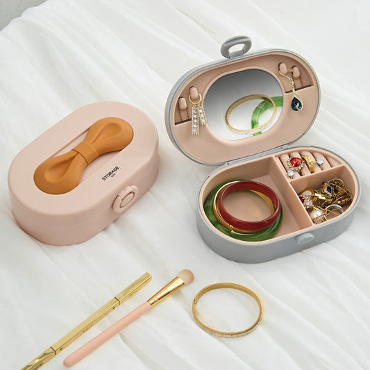Spacious Bow Handle Jewelry Box for Rings, Bracelets, Necklaces, and Earrings - Versatile High-End Storage Solution. Livingsource